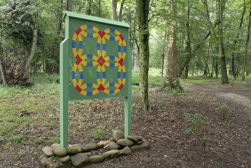 IslandPark-square-installed Quilt Trail quilt block on a stand at Island Park, Bryson City NC