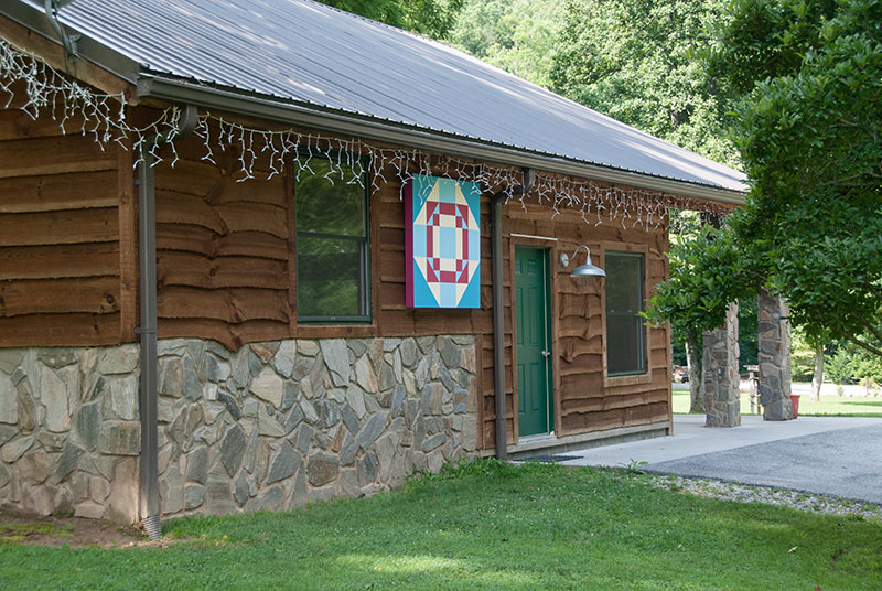 Lands-Creek-square-installed Quilt trail quilt block on Harmony Hall at Lands Creek Log Cabins Bryson City NC
