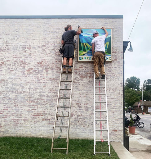 two-on-ladders Installing a quilt square